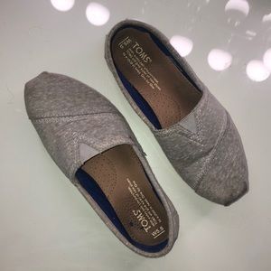 TOMS grey slip on’s